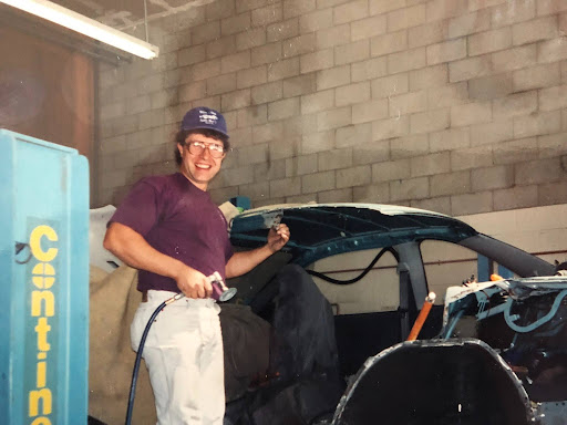 Jozef Hornik working in an auto body shop